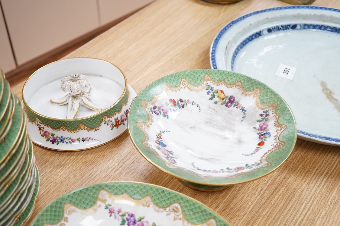 A 19th century French Paris porcelain part dessert service with green scale borders by Nast Paris, largest 26cm wide